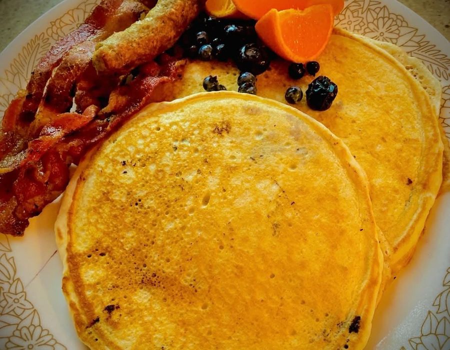 Pancakes with bacon and fresh fruit