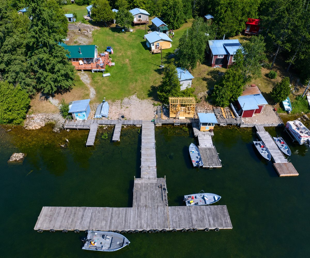 Aerial view of the docks and guest cabins along the Rowan Lake shoreline